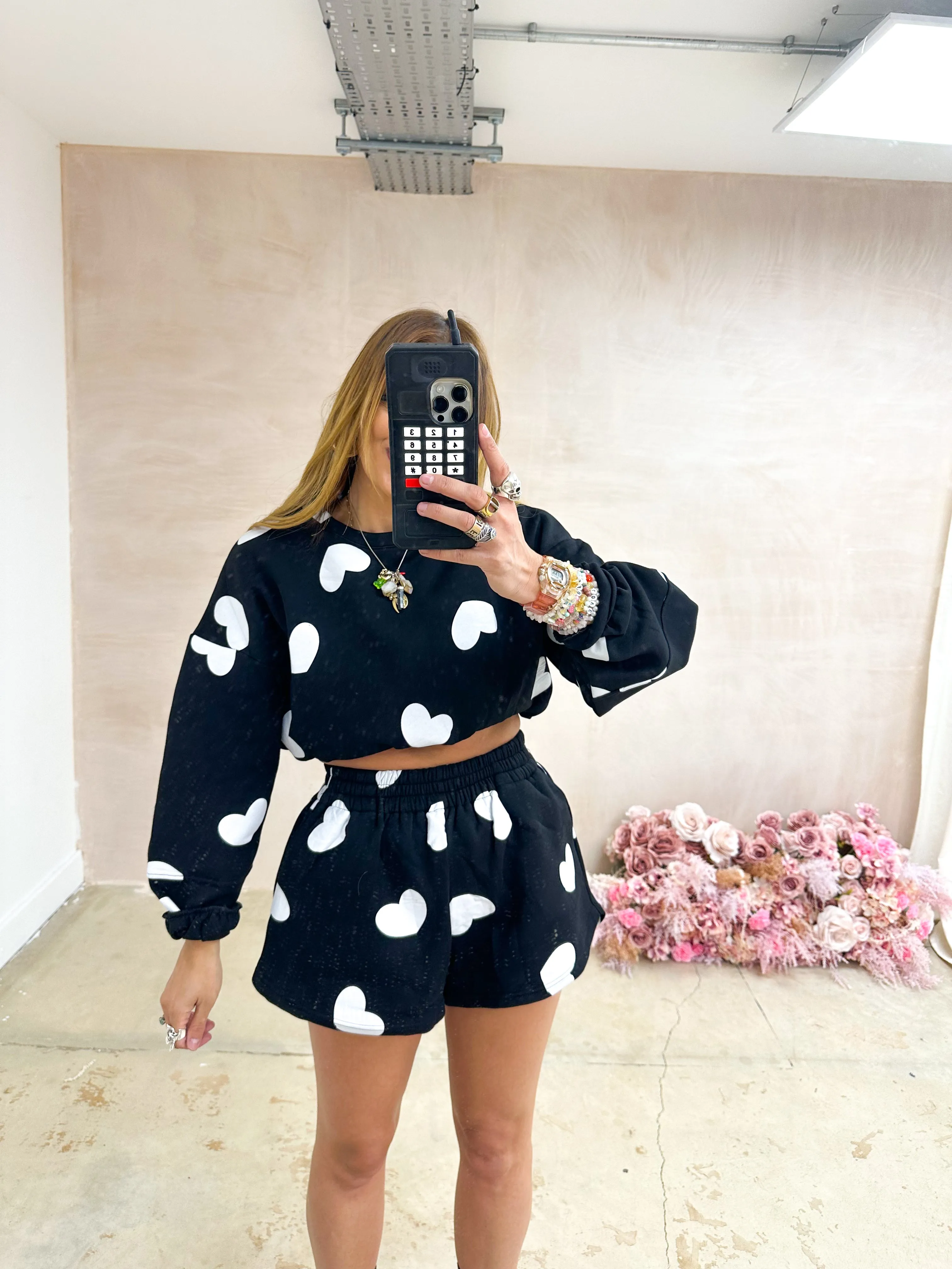 All Over Scattered Heart Sweatshirt In Black